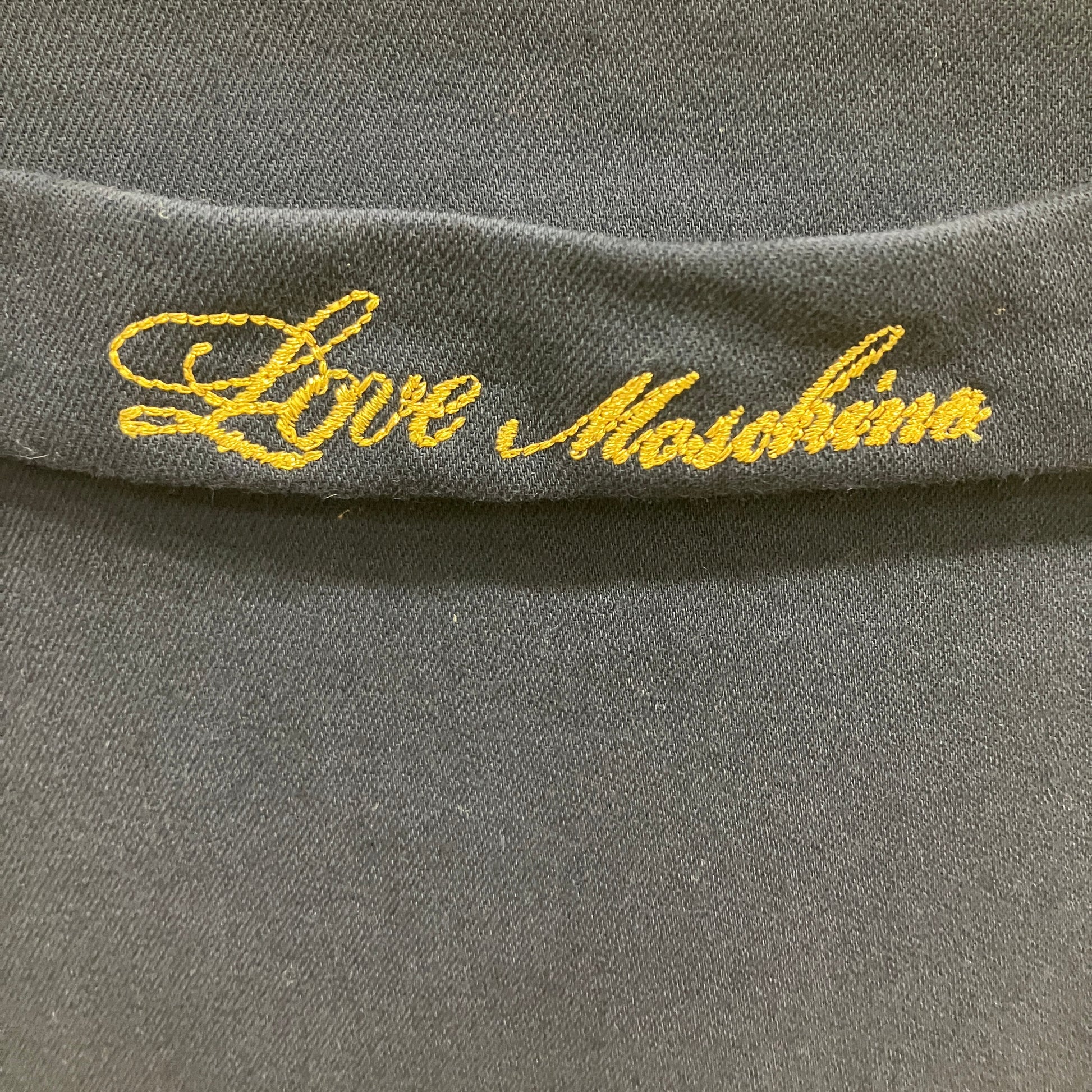Gray fabric with 'Love Moschino' embroidery in yellow