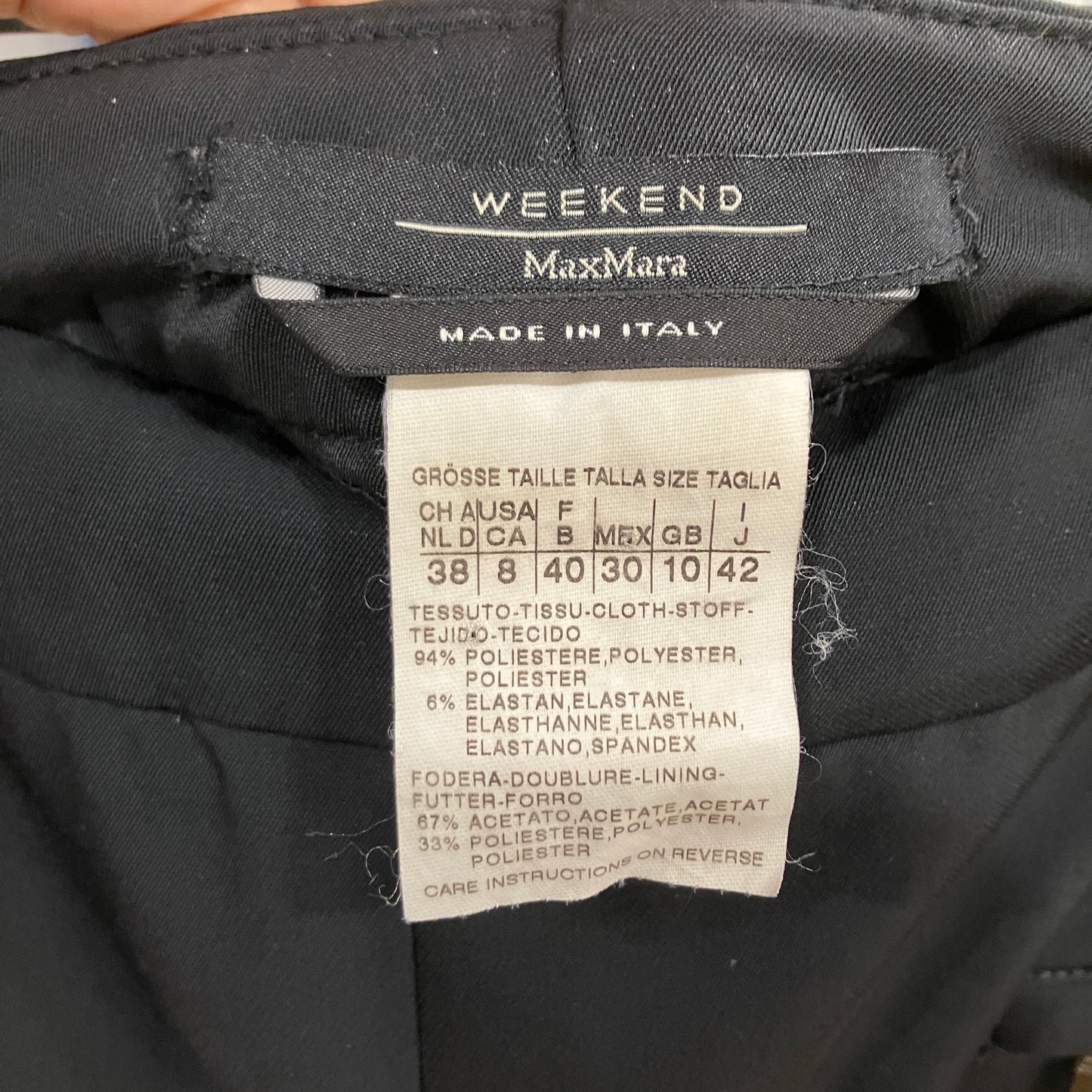 Max Mara label on a garment with size information