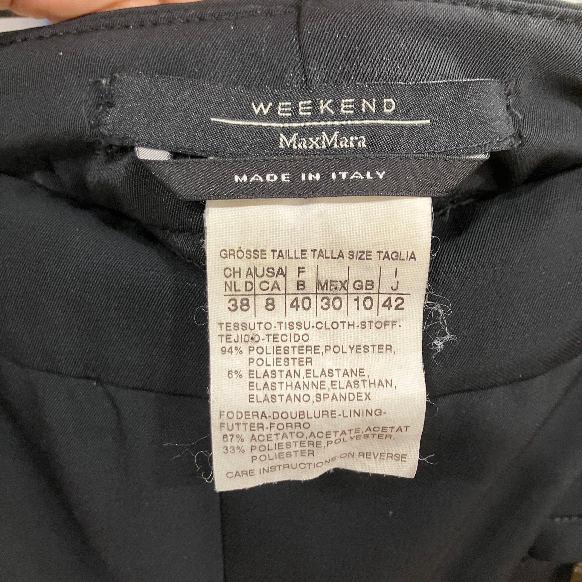 Max Mara label on a garment with size information