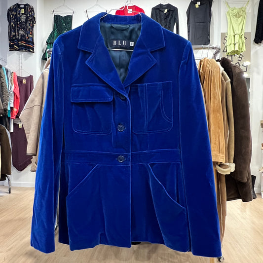 Blue jacket with 'BLU' label in a clothing store setting