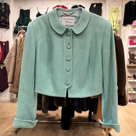 Light blue jacket on a rack in a clothing store