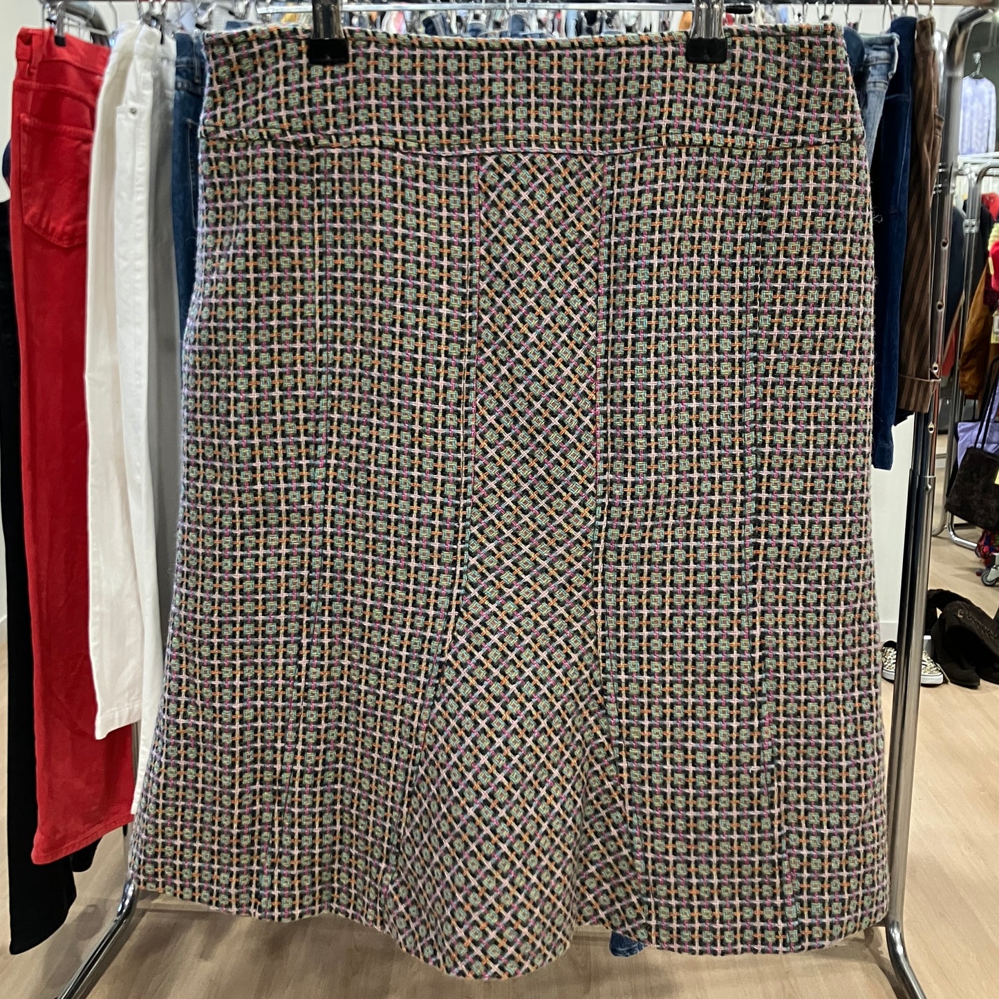 Patterned skirt on a rack in a store setting