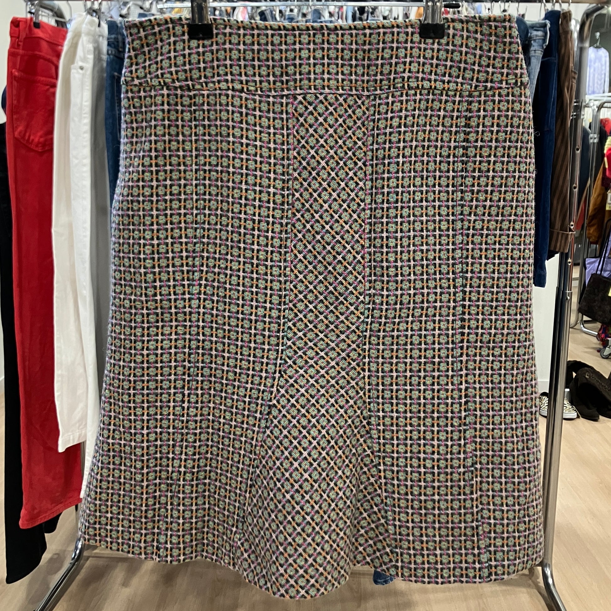 Patterned skirt on a rack in a store setting