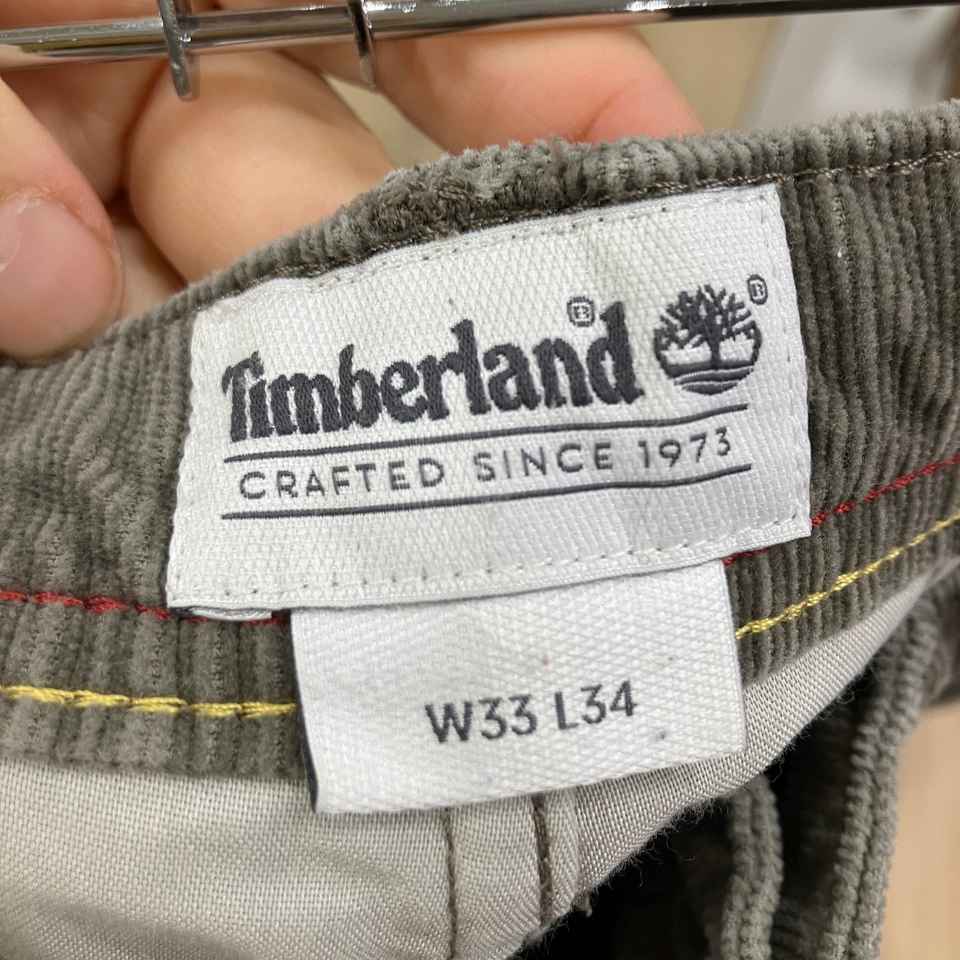 Timberland label on a piece of clothing with size information