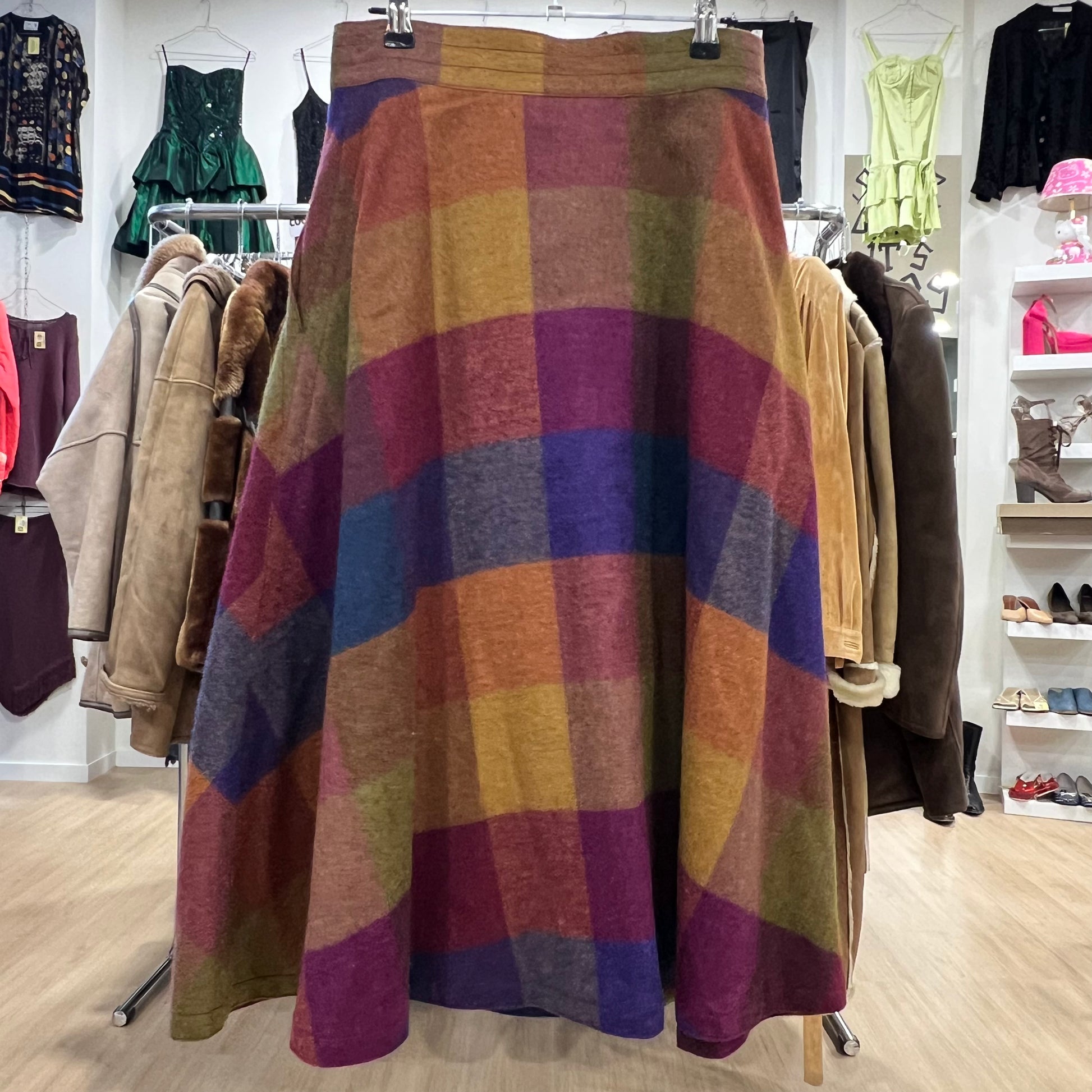 Multicolored checkered skirt on a rack in a clothing store