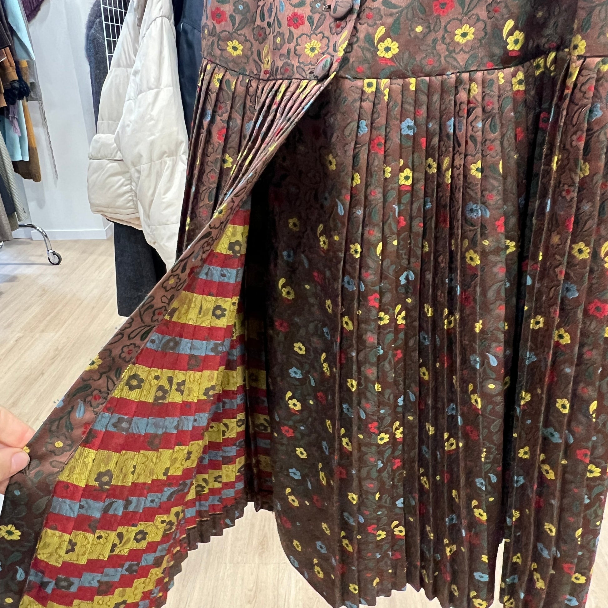 Patterned skirt with a colorful design on a wooden floor