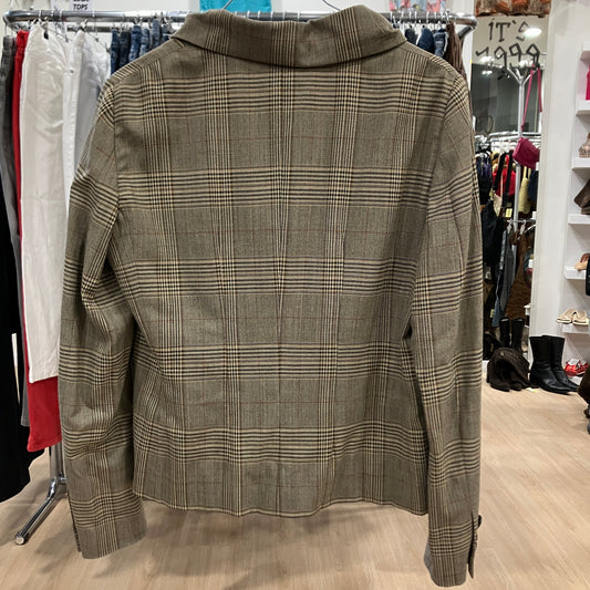 Plaid jacket on a rack in a store setting
