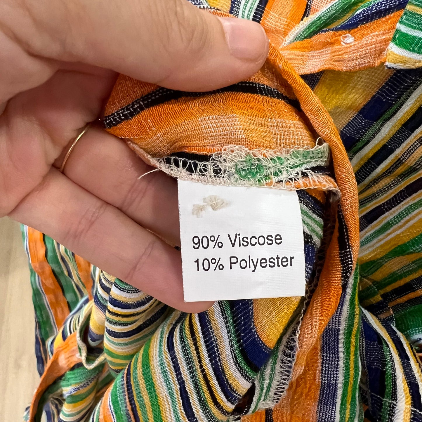 green orange striped short sleeve shirt