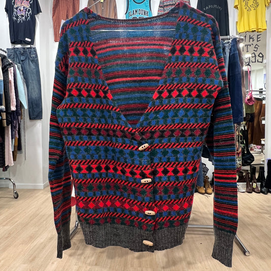 Patterned sweater on a rack in a clothing store