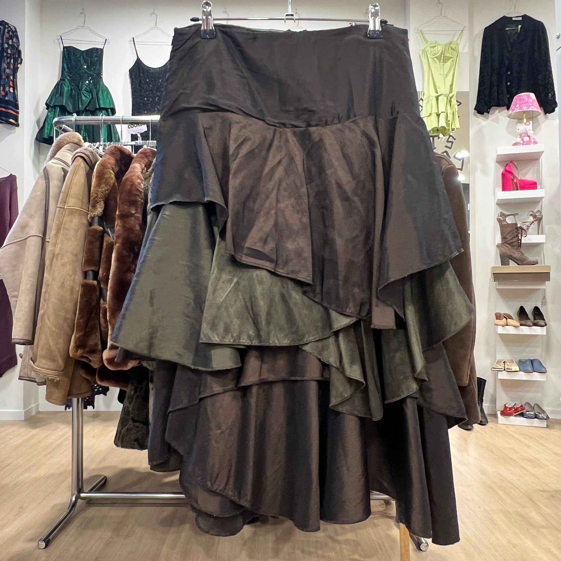Stack of layered skirts on a rack in a clothing store