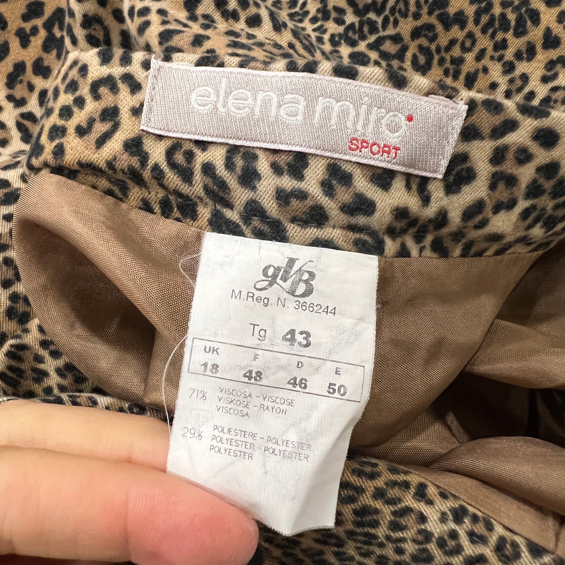 Leopard print garment with 'elena miro' and 'gvb' labels