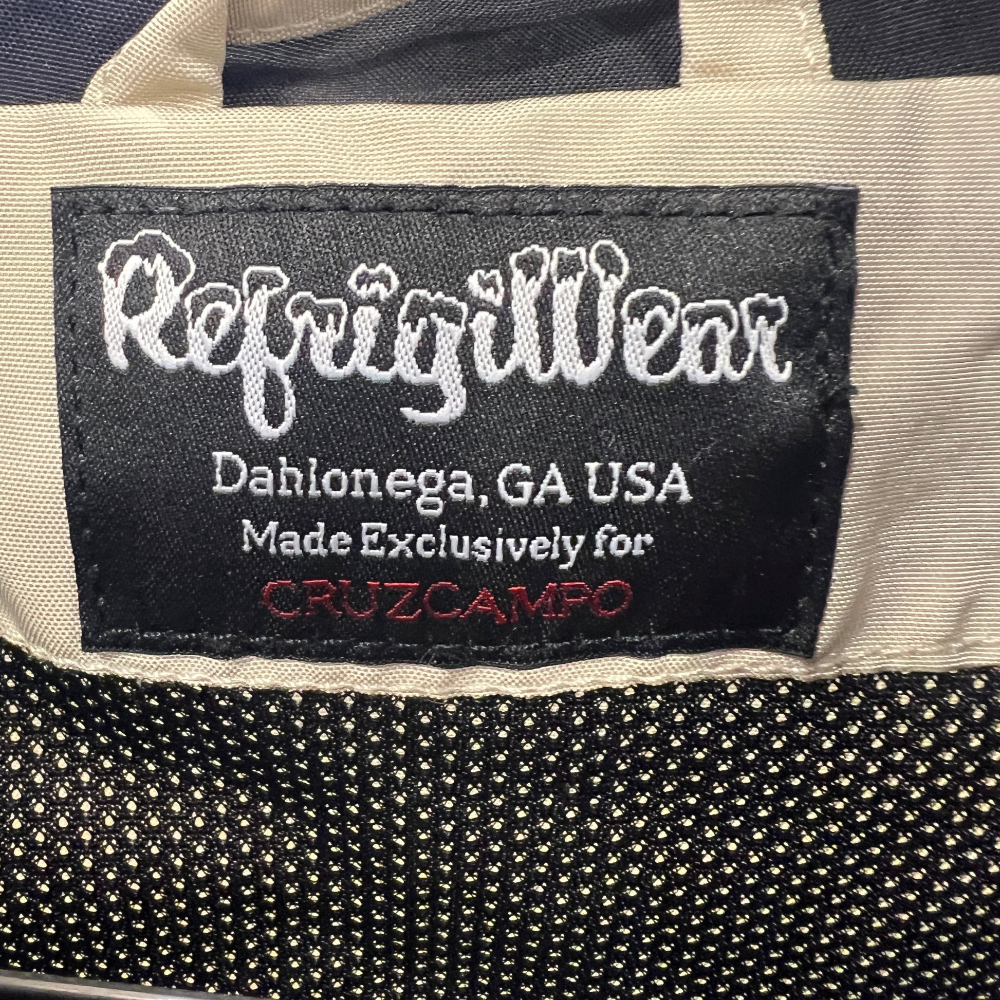 Refrigillwear label on a Cruzcampo product with 'Dahlonega, GA USA' text