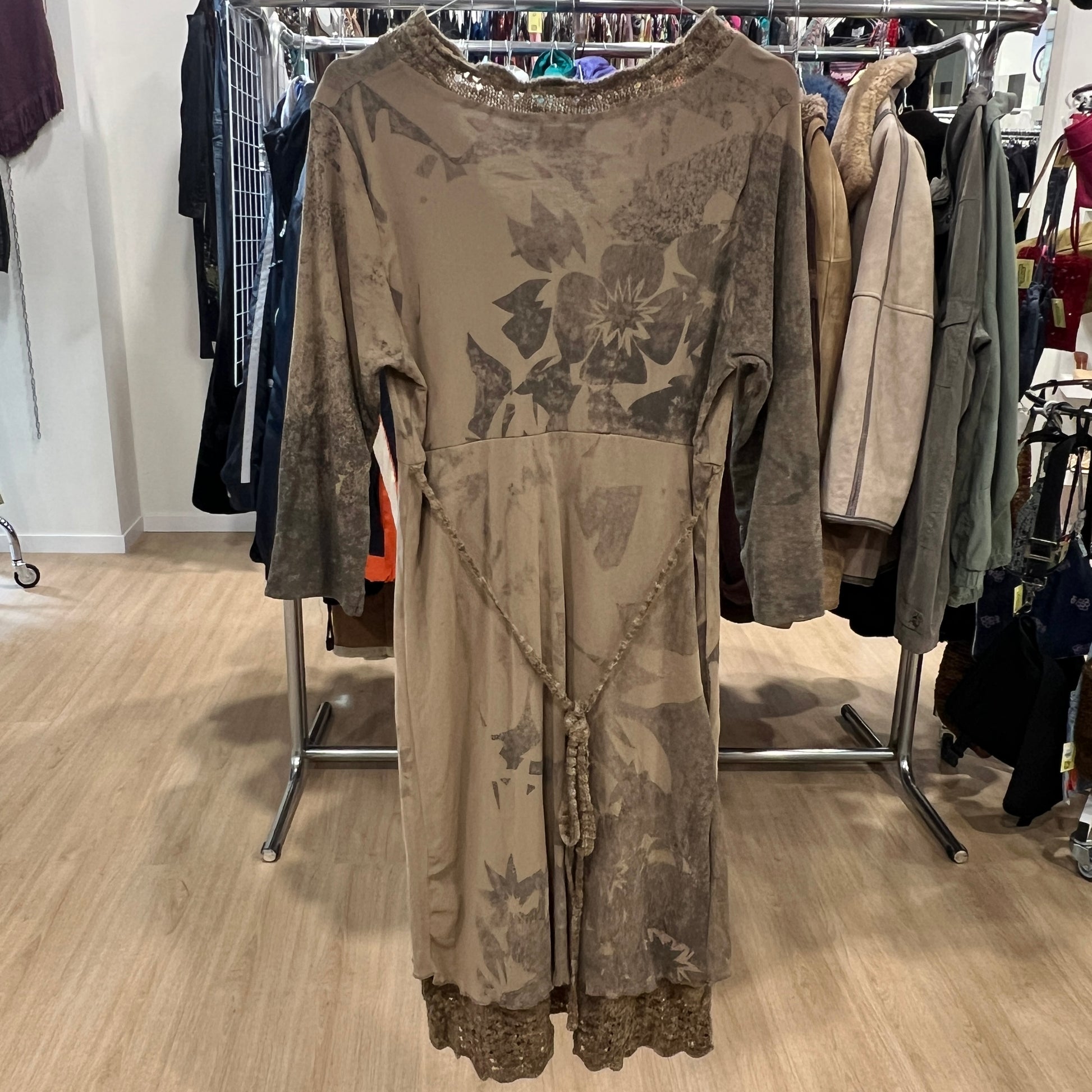 Floral patterned dress on a rack in a clothing store