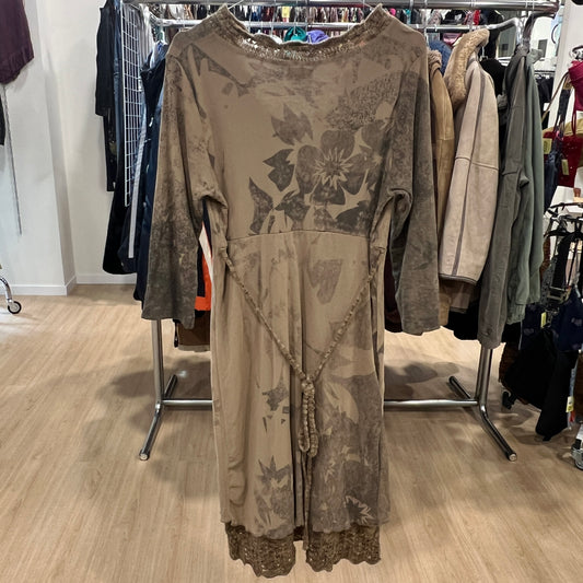 Floral patterned dress on a rack in a clothing store