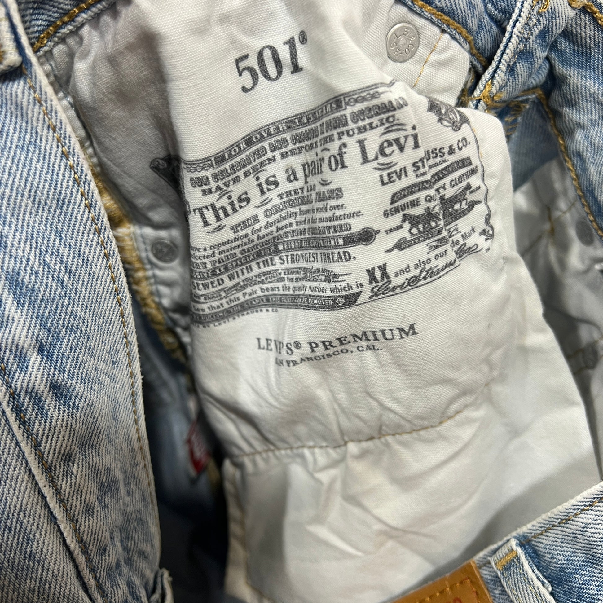 Levi's jeans with a brand label on a denim background