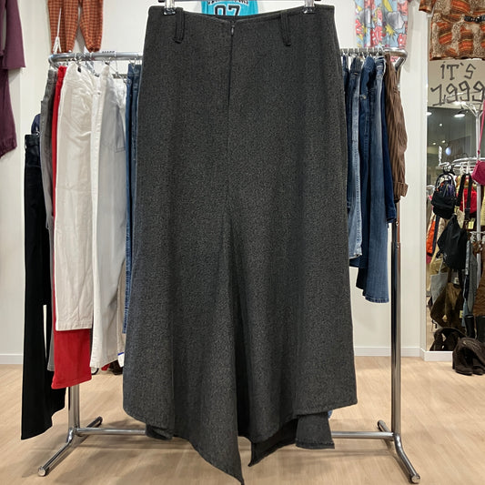 Gray skirt hanging on a rack in a clothing store