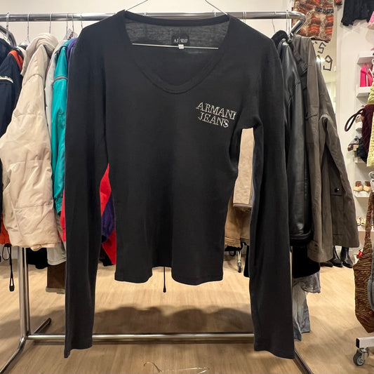 Black long-sleeve shirt with 'Armani Jeans' logo on a clothing rack