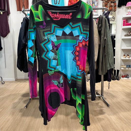 Colorful Desigual dress on a rack in a store setting