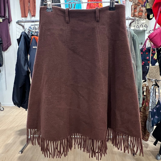 Brown skirt with fringe hanging in a store