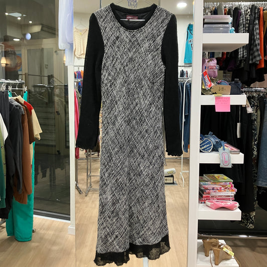 Black and white patterned dress on a rack in a store setting