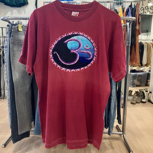 double apple burgundy tee with blue om meditation graphic