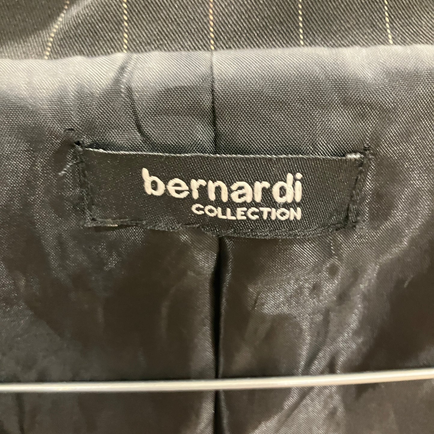 Gray quilted jacket with 'bernardi collection' label