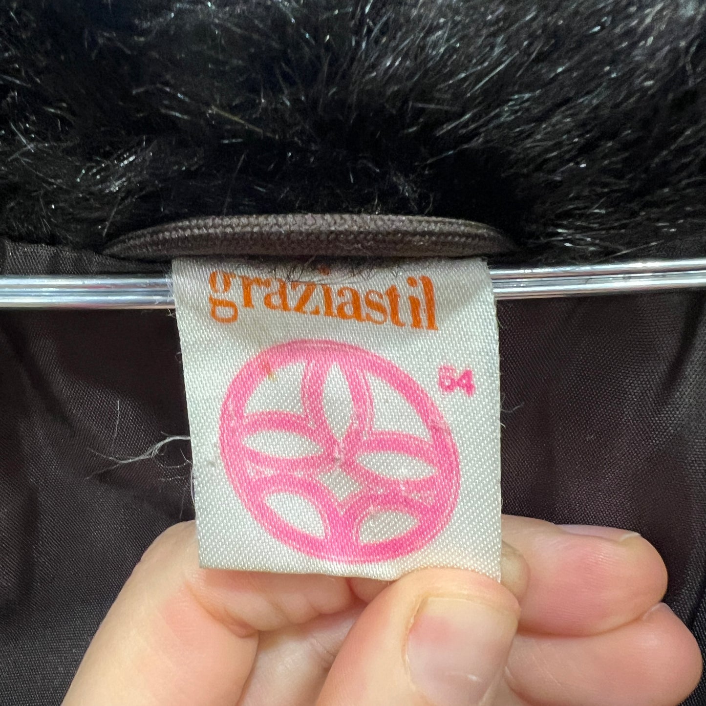 Graziastil label on a product with black fur trim