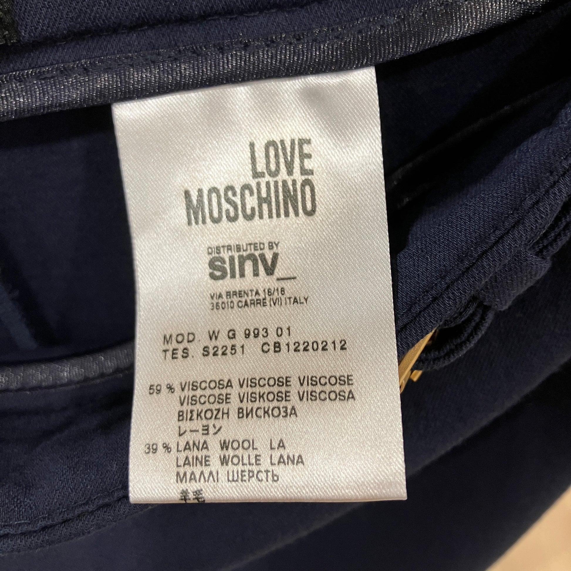 Love Moschino label on a garment with visible text and branding