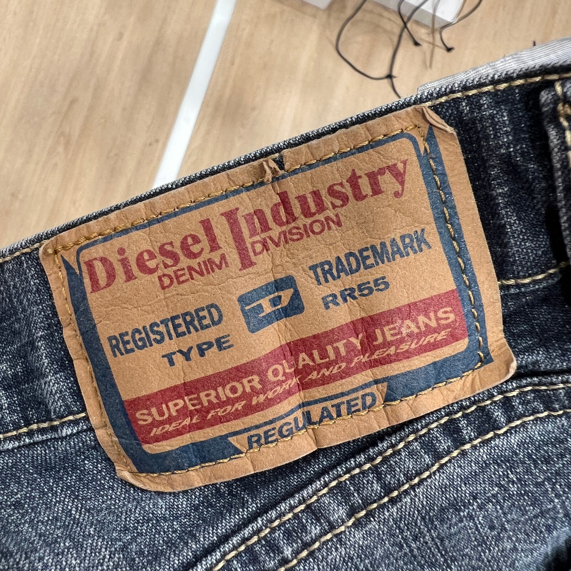 Close-up of a Diesel denim label on a pair of jeans