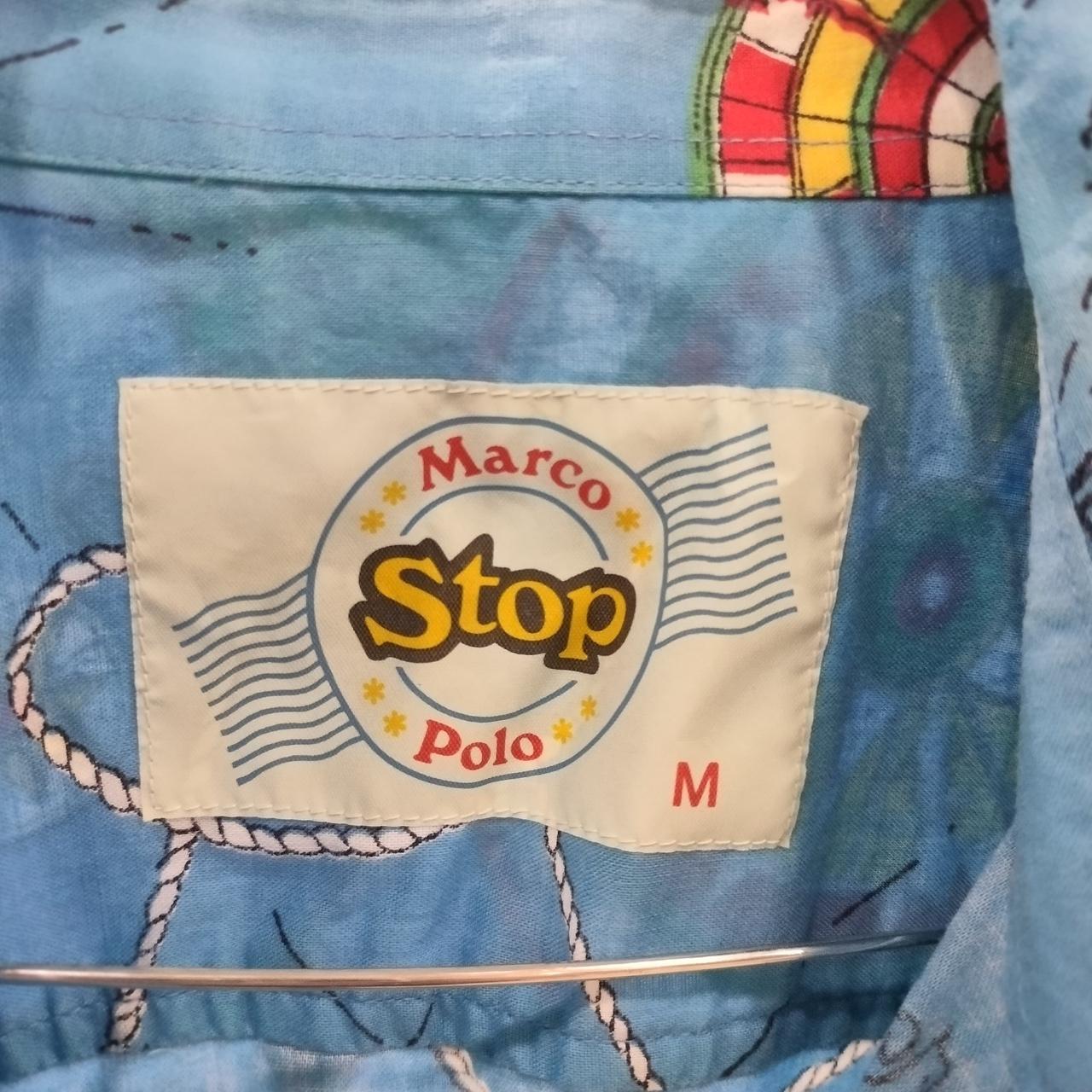 Vintage Marco Polo Stop shirt tag on blue patterned fabric, size medium
