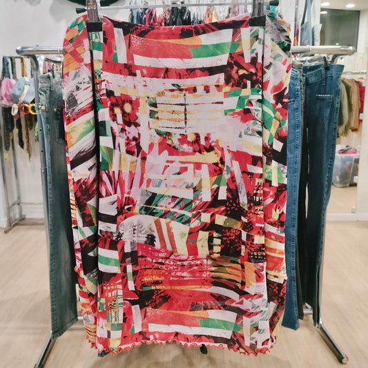 Colorful abstract print skirt on hanger in second hand fashion store