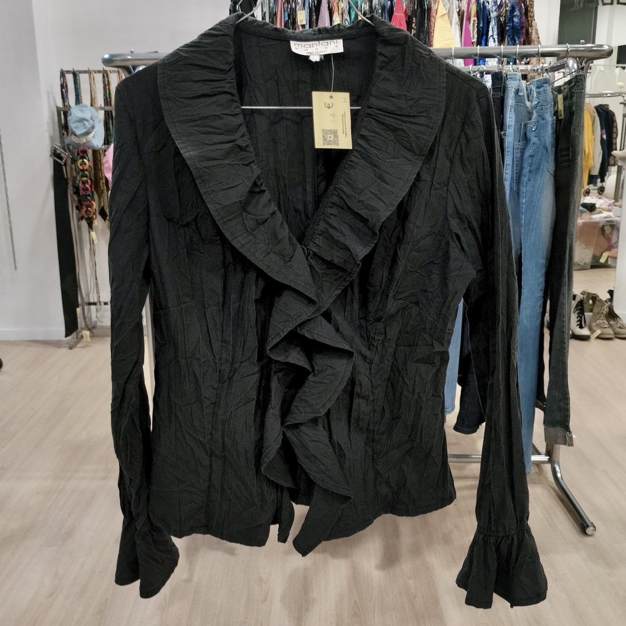 Mantani black ruffle shirt with a touch of whimsy