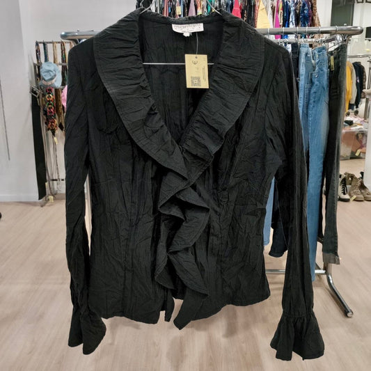 Mantani black ruffle shirt with a touch of whimsy