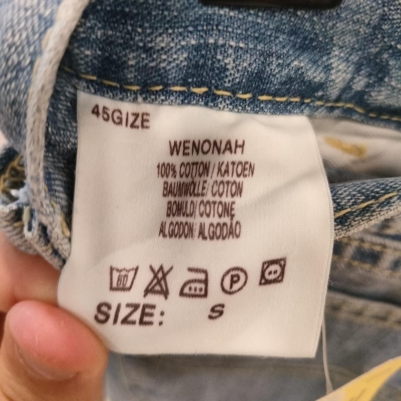 Wenonah jeans label with size and care instructions