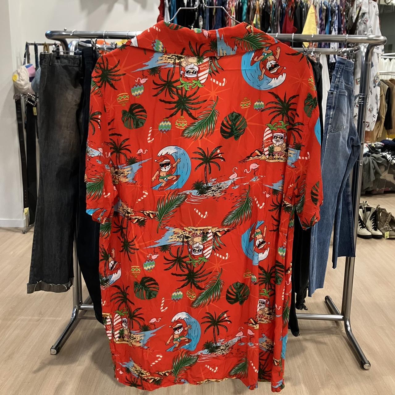 Joy red hawaiian shirt with santa surfing