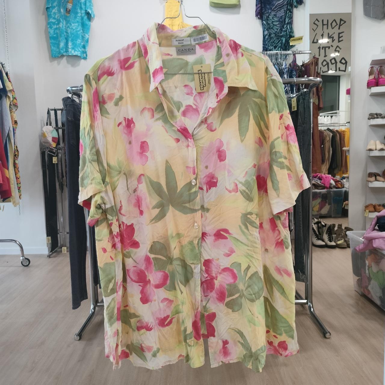Floral shirt on a hanger in a store setting