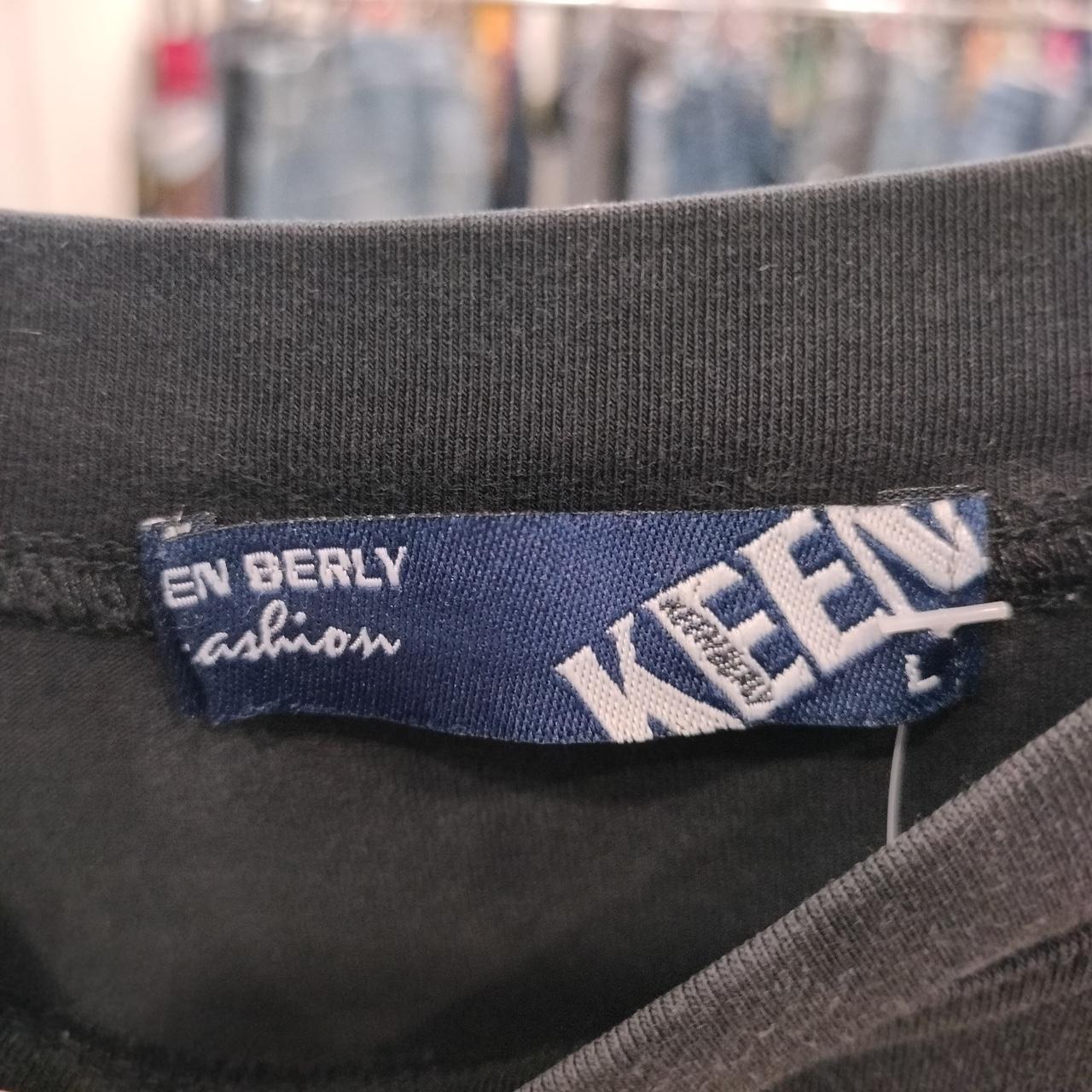 Keen black long sleeve top with scorpion