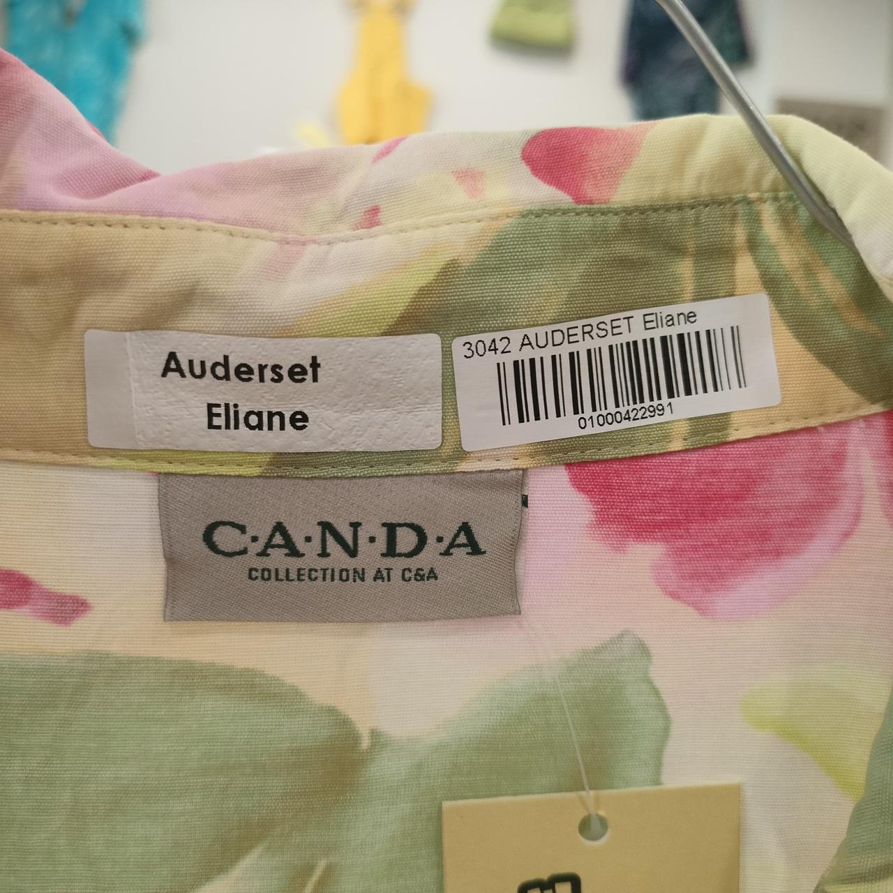 Floral garment with 'Auderset Eliane' label and 'CANDA' branding