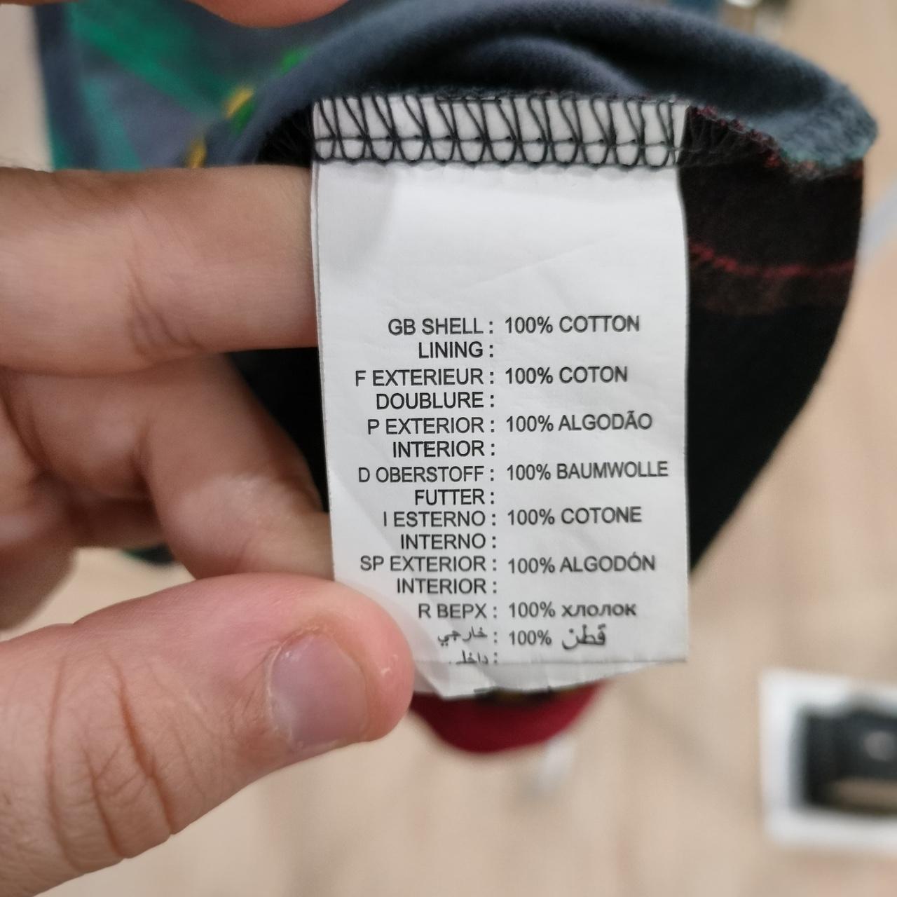Clothing label with text on a blurred background