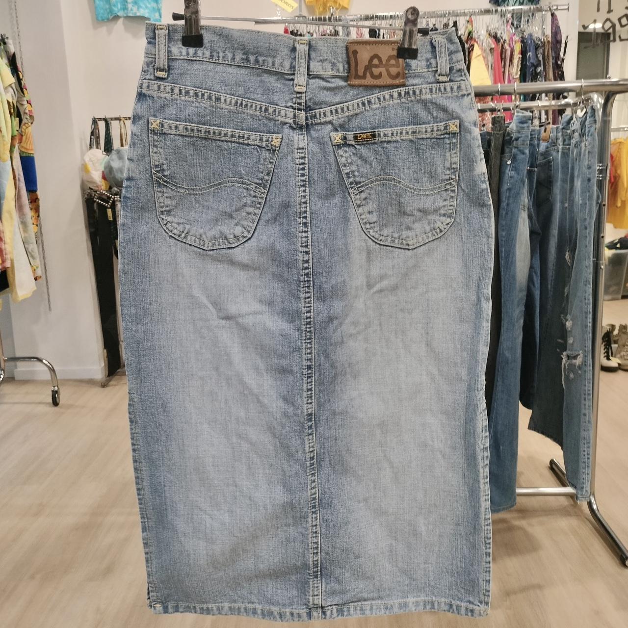 Denim skirt on a rack in a store setting