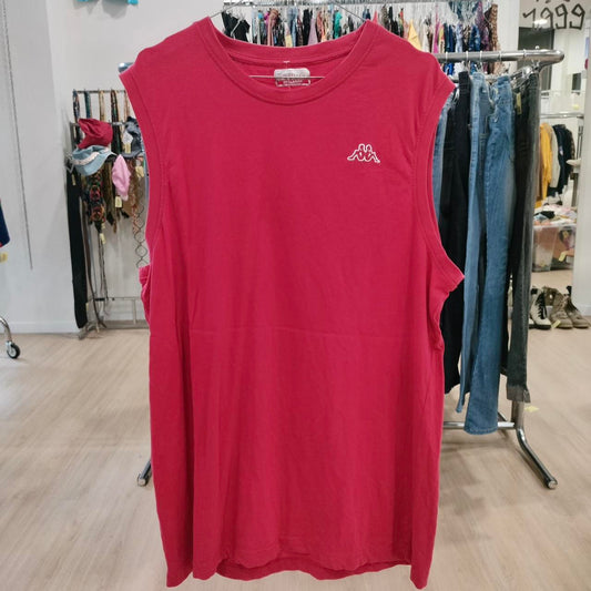 Red sleeveless shirt with a logo on a rack in a store