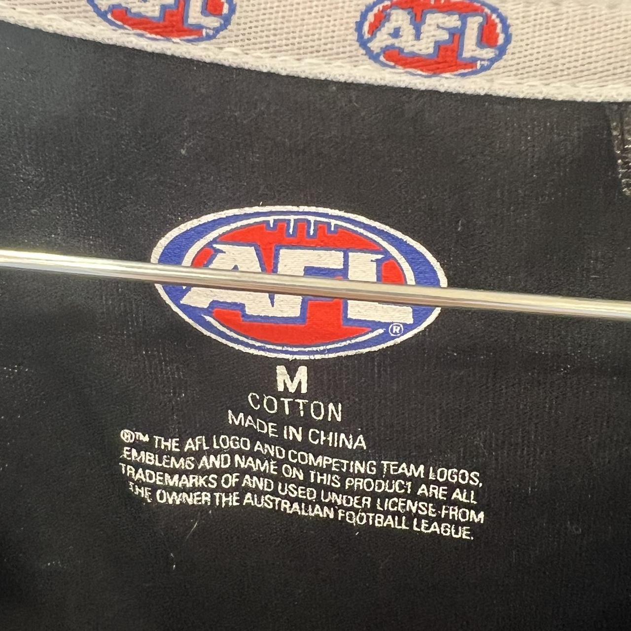 Black t-shirt with AFL logo and text, showing a close-up of the label