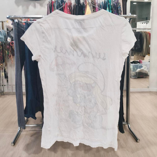 White short sleeve graphic t-shirt displayed in a second hand clothing store
