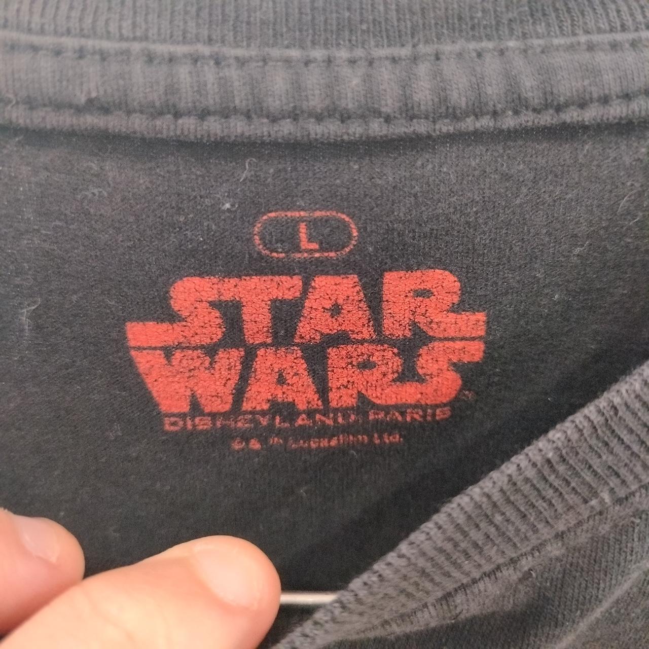 Star Wars Disneyland Paris logo on a dark fabric background
