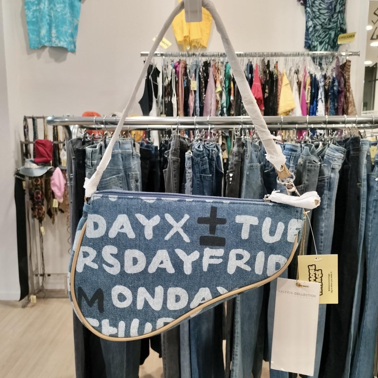 Blue bag with text in a clothing store
