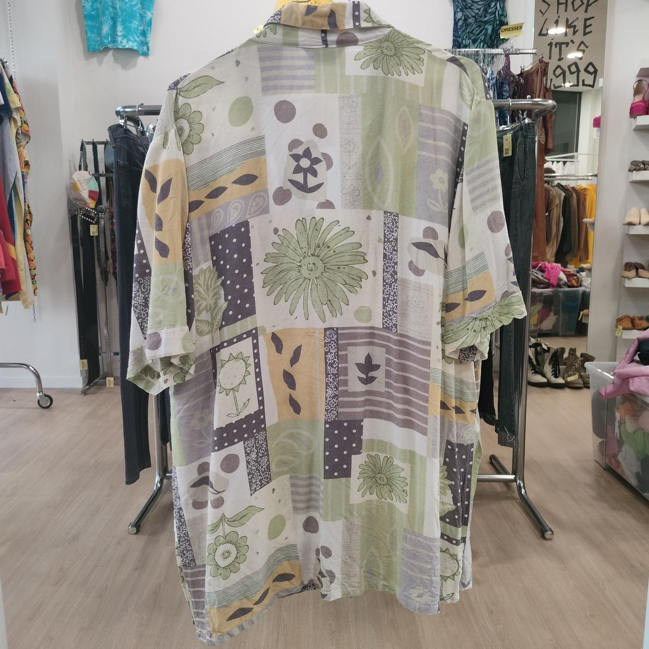 Patterned shirt on a rack in a store setting