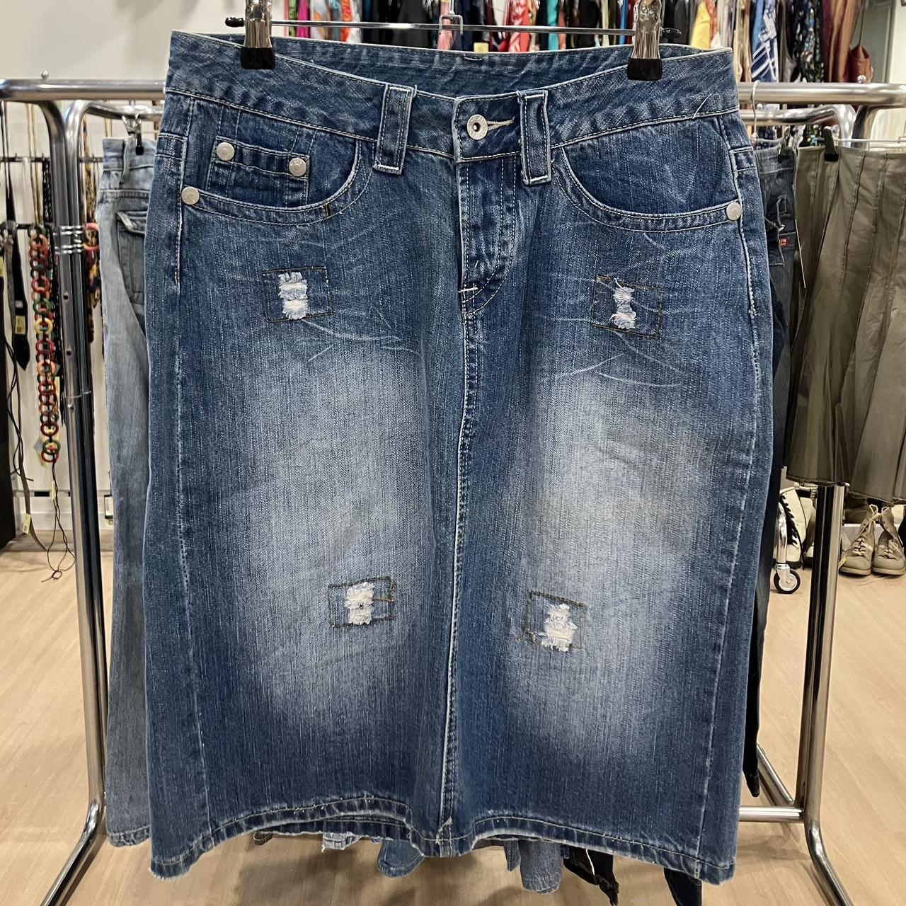 distressed denim knee length skirt with rips