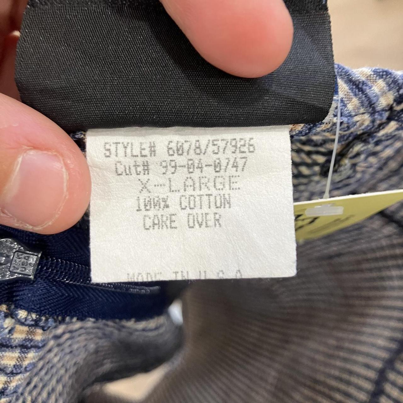 Clothing tag with product details on a garment